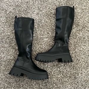 Black chunky knee high boots